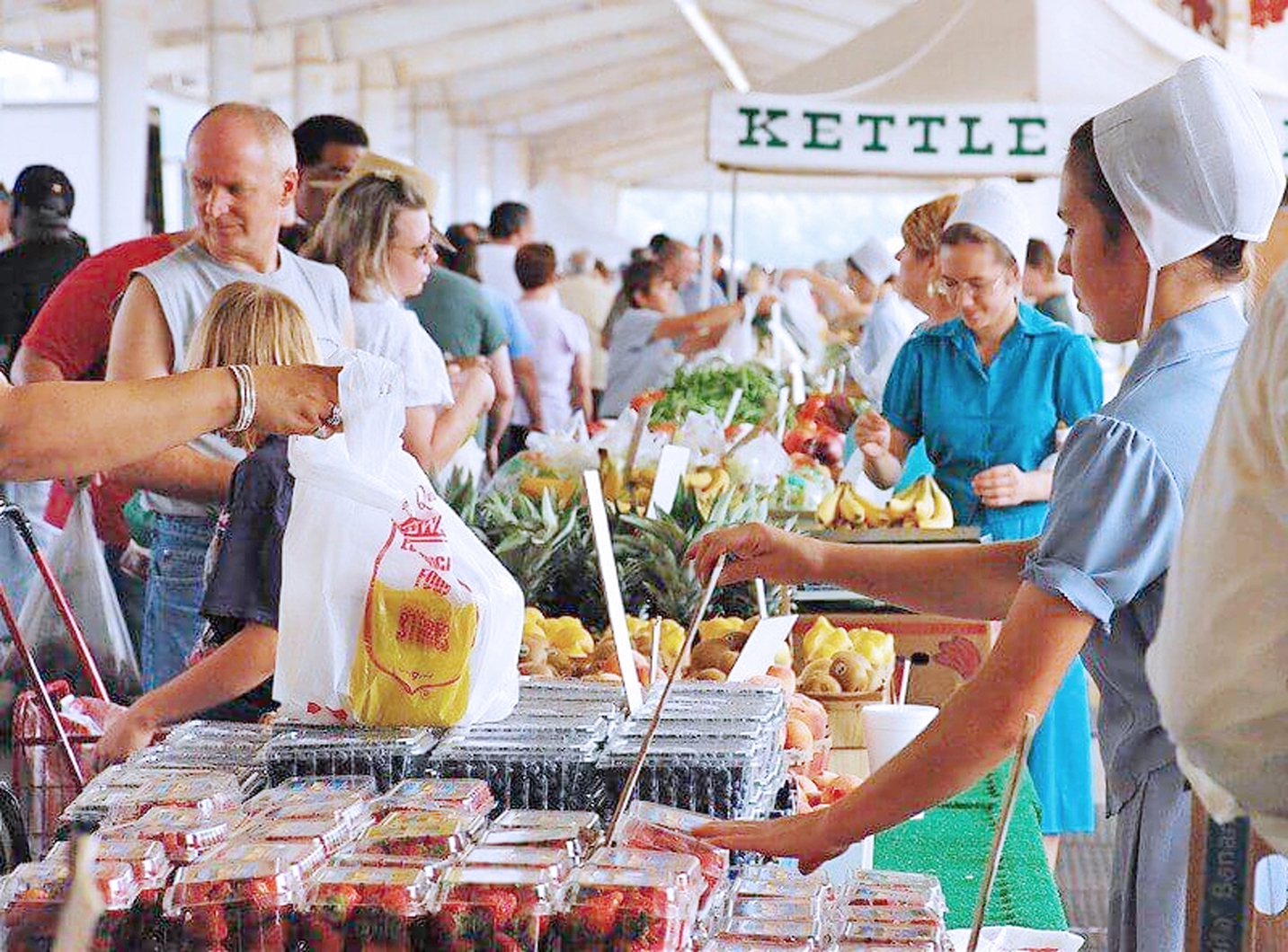 Stephanie Buying Fruit at Hartville flea market